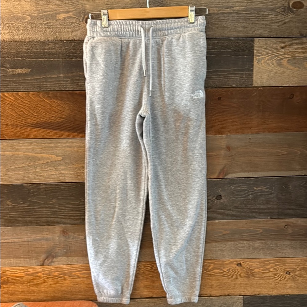 The North Face Gray Sweatpants with Tapered Leg and Elastic Cuffs